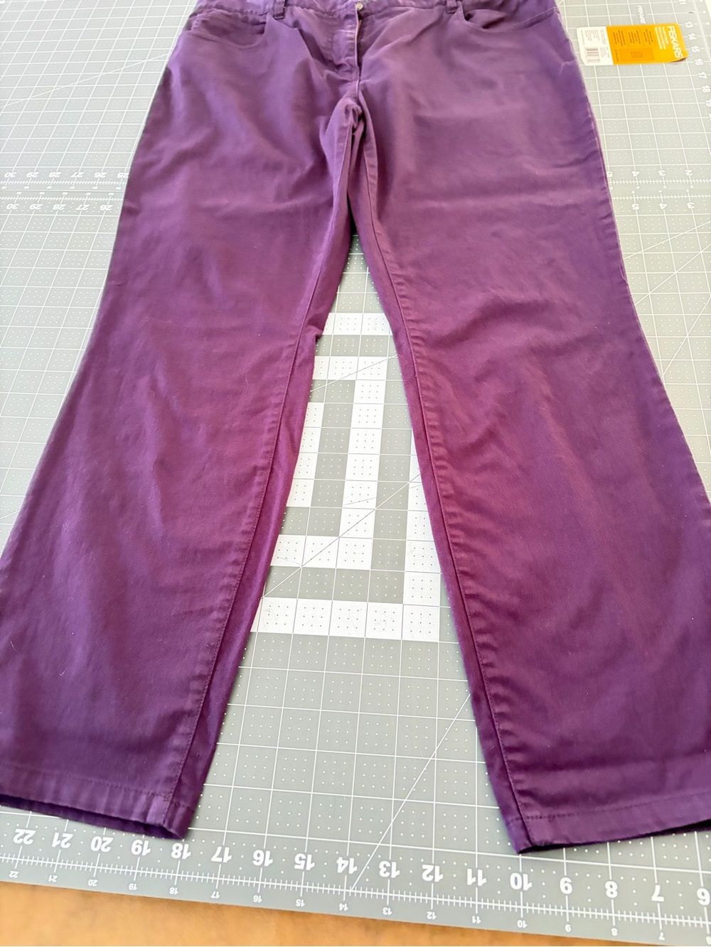 Trina Turk Purple Straight-Leg Jeans (matches shirt though not in photo)